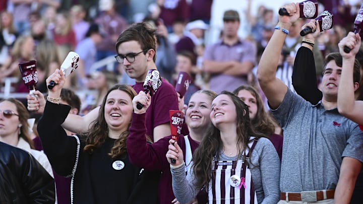 Nov 23, 2024; Starkville, Mississippi, USA; Mississippi State Bulldogs fans cheer during the first quarter against the Missouri Tigers at Davis Wade Stadium at Scott Field. Mandatory Credit: Matt Bush-Imagn Images
