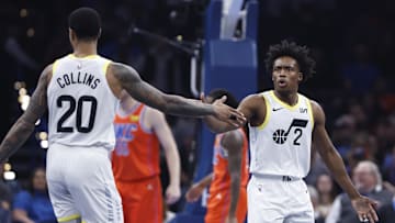 Dec 3, 2024; Oklahoma City, Oklahoma, USA; Utah Jazz guard Collin Sexton (2) and forward John Collins (20) high five after a play against the Oklahoma City Thunder during the first quarter of an NBA Cup game at Paycom Center. Mandatory Credit: Alonzo Adams-Imagn Images