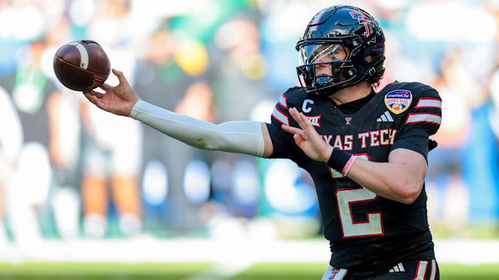 Jan 1, 2026; Miami Gardens, FL, USA; Texas Tech Red Raiders quarterback Behren Morton (2) passes the ball against the Oregon Ducks during the first half of the 2025 Orange Bowl and quarterfinal game of the College Football Playoff at Hard Rock Stadium. Mandatory Credit: Sam Navarro-Imagn Images