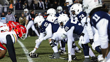 Penn State football offensive line before a snap against Maryland