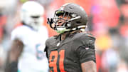 Oct 19, 2025; Cleveland, Ohio, USA; Cleveland Browns defensive end Alex Wright (91) celebrates after a play against the Miami Dolphins during the first quarter at Huntington Bank Field. Mandatory Credit: Ken Blaze-Imagn Images