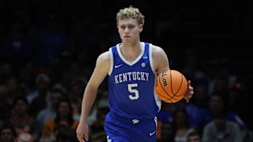 Mar 28, 2025; Indianapolis, IN, USA; Kentucky Wildcats guard Collin Chandler (5) dribbles the ball against the Tennessee Volunteers in the first half during a Midwest Regional semifinal of the 2025 NCAA tournament at Lucas Oil Stadium. Mandatory Credit: Trevor Ruszkowski-Imagn Images