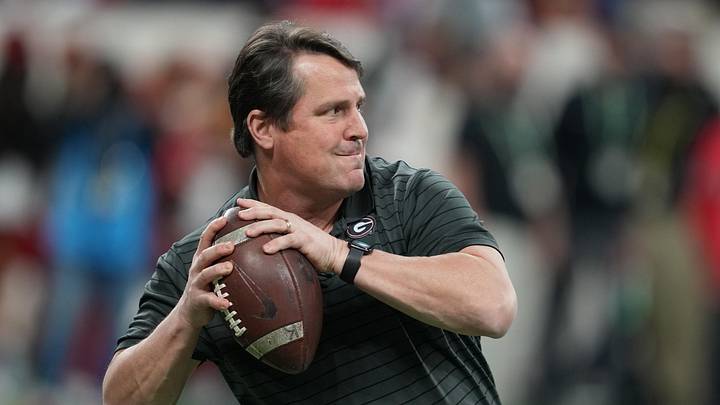 Jan 10, 2022; Indianapolis, IN, USA; Georgia Bulldogs defensive analyst Will Muschamp throws a football before the 2022 CFP college football national championship game against the Alabama Crimson Tide at Lucas Oil Stadium. Mandatory Credit: Kirby Lee-Imagn Images