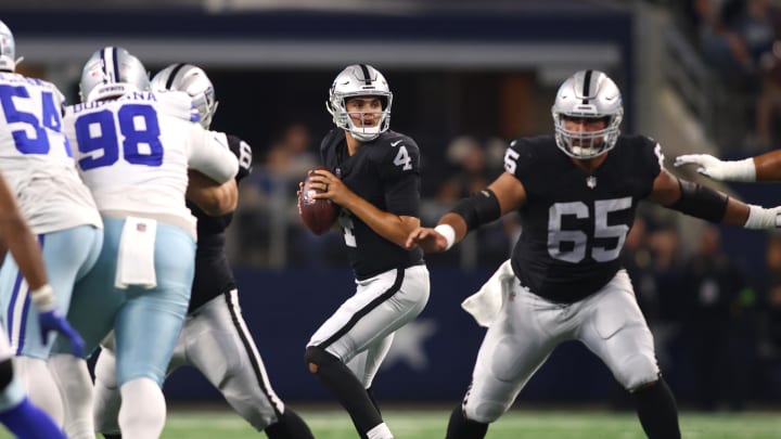 Aug 26, 2023; Arlington, Texas, USA; Las Vegas Raiders quarterback Aidan O'Connell (4) in the pocket in the first quarter against the Dallas Cowboys at AT&T Stadium. Mandatory Credit: Tim Heitman-USA TODAY Sports