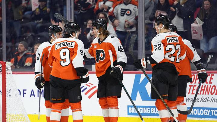 Jan 31, 2026; Philadelphia, Pennsylvania, USA; Philadelphia Flyers center Trevor Zegras (46) reacts with teammates after scoring a goal against the Los Angeles Kings in the second period at Xfinity Mobile Arena.