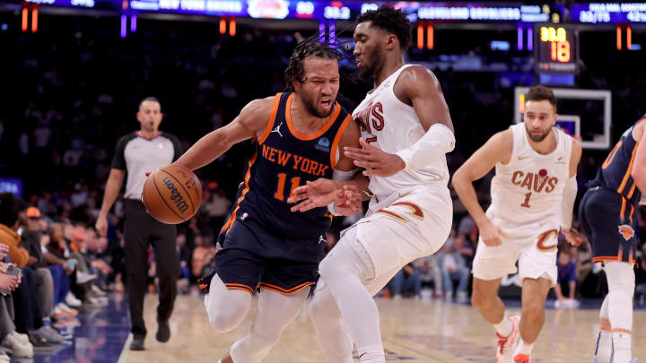 Nov 1, 2023; New York, New York, USA; New York Knicks guard Jalen Brunson (11) controls the ball against Cleveland Cavaliers guard Donovan Mitchell (45) during the fourth quarter at Madison Square Garden. Mandatory Credit: Brad Penner-USA TODAY Sports
