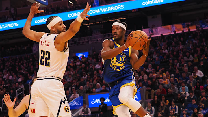 Mar 17, 2025; San Francisco, California, USA; Golden State Warriors forward Jimmy Butler III (10) passes the ball against Denver Nuggets forward Zeke Nnaji (22) during the first quarter at Chase Center. Mandatory Credit: Kelley L Cox-Imagn Images Mar 17, 2025; San Francisco, California, USA; Golden State Warriors forward Jimmy Butler III (10) passes the ball against Denver Nuggets forward Zeke Nnaji (22) during the first quarter at Chase Center. Mandatory Credit: Kelley L Cox-Imagn Images