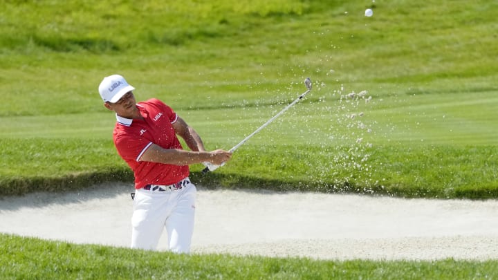 Xander Schauffele opened with a 6-under 65 at Le Golf National.