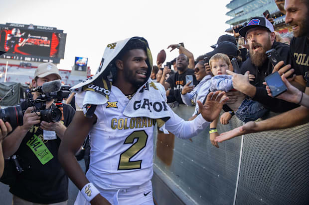 Oct 19, 2024; Tucson, Arizona, USA; Colorado Buffalos quarterback Shedeur Sanders (2) greets fans after defeating the Arizona