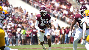 Sep 7, 2024; College Station, Texas, USA; Texas A&M Aggies quarterback Marcel Reed (10) runs the ball against the McNeese State Cowboys during the second quarter at Kyle Field.