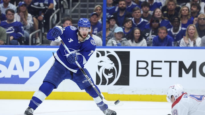Apr 29, 2026; Tampa, Florida, USA; Tampa Bay Lightning center Anthony Cirelli (71) passes them puck against the Montreal Canadiens in the third period during game five of the first round of the 2026 Stanley Cup Playoffs at Benchmark International Arena. Mandatory Credit: Nathan Ray Seebeck-Imagn Images