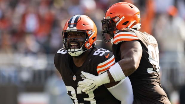 Cleveland Browns defensive tackle Shelby Harris celebrates a tackle for loss as defensive tackle Maurice Hurst II 