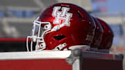 Aug 28, 2025; Houston, Texas, USA; General view of Houston Cougars helmets on the sideline before the game against the Stephen F. Austin Lumberjacks at TDECU Stadium. Mandatory Credit: Troy Taormina-Imagn Images