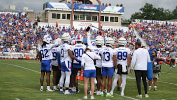 The Bills wide receiver unit huddle up at the end of position drills during day three of Buffalo Bills training camp at St. John Fisher University Friday, July 25, 2025 in Pittsford, NY.