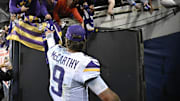 Minnesota Vikings quarterback J.J. McCarthy reacts after defeating the Chicago Bears at Soldier Field.