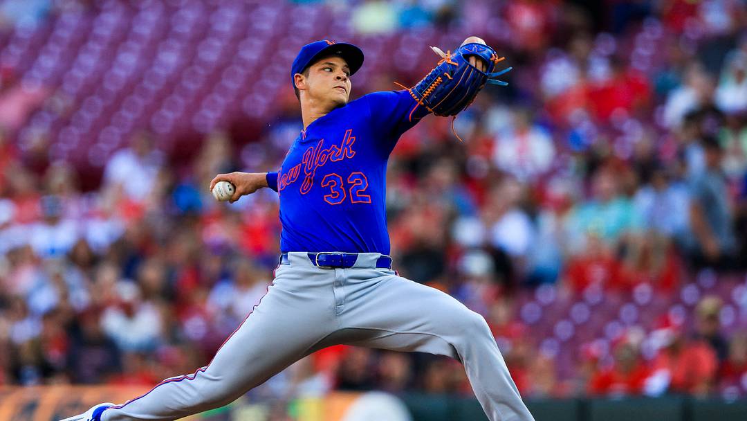 Mets starting pitcher Tobias Myers (32) pitches against the Cincinnati Reds in the first inning at Great American Ball Park. 