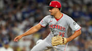 Cincinnati Reds pitcher Chase Burns (26) throws a pitch in the eighth inning of the MLB National League Wild Card Game 2 between the Los Angeles Dodgers and the Cincinnati Reds at Dodger Stadium in Los Angeles on Wednesday, Oct. 1, 2025. The Reds were eliminated from the postseason with an 8-4 loss to the reining World Series Champions La Dodgers.