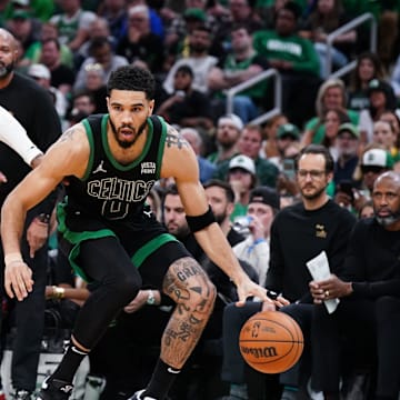 May 15, 2024; Boston, Massachusetts, USA; Boston Celtics forward Jayson Tatum (0) drives the ball against Cleveland Cavaliers forward Marcus Morris Sr. (24) in the third quarter during game five of the second round for the 2024 NBA playoffs at TD Garden. Mandatory Credit: David Butler II-Imagn Images