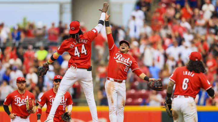 Jun 8, 2024; Cincinnati, Ohio, USA; Cincinnati Reds outfielder TJ Friedl (29) high fives shortstop Elly De La Cruz (44) after the victory over the Chicago Cubs at Great American Ball Park. Mandatory Credit: Katie Stratman-USA TODAY Sports