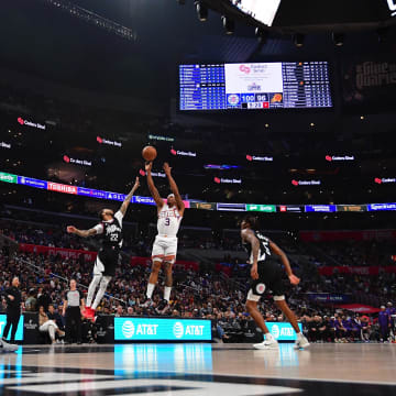 Phoenix Suns guard Bradley Beal (3) shoots against Los Angeles Clippers guard Xavier Moon (22) during the second half at Crypto.com Arena. 