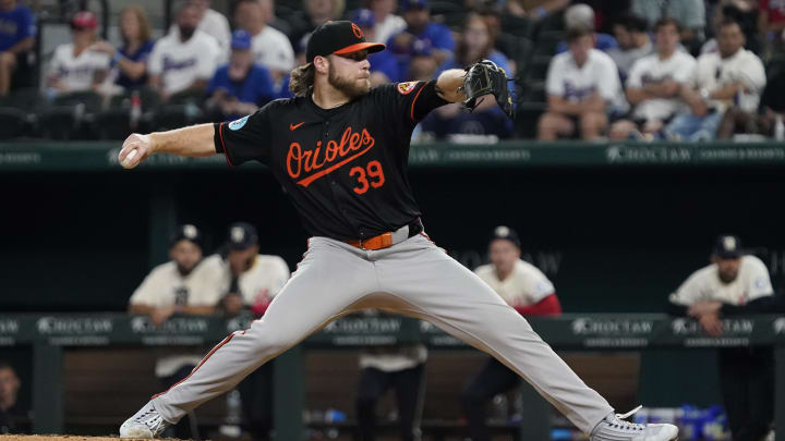 Jul 19, 2024; Arlington, Texas, USA; Baltimore Orioles pitcher Corbin Burnes (39) throws to the plate during the sixth inning against the Texas Rangers at Globe Life Field. 