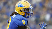 Oct 12, 2024; Pittsburgh, Pennsylvania, USA;  Pittsburgh Panthers defensive back Kyle Louis (9) reacts after a defensive stop against the California Golden Bears during the third quarter at Acrisure Stadium. Pittsburgh won 17-15. Mandatory Credit: Charles LeClaire-Imagn Images