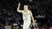 Dallas Wings guard Paige Bueckers reacts after scoring against the Chicago Sky during the first half at Wintrust Arena.