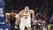 Denver Nuggets center Nikola Jokic dribbles against the Oklahoma City Thunder during Game 1 of the second round in the 2025 NBA Playoffs. 