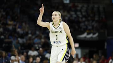 Dallas Wings guard Paige Bueckers reacts after scoring against the Chicago Sky.