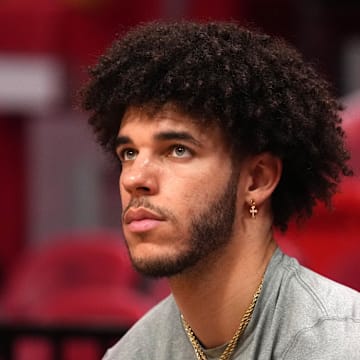 Dec 11, 2021; Miami, Florida, USA; Chicago Bulls guard Lonzo Ball sits court-side prior to the game against the Miami Heat at FTX Arena. Mandatory Credit: Jasen Vinlove-Imagn Images