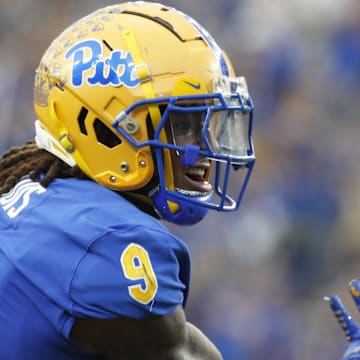 Oct 12, 2024; Pittsburgh, Pennsylvania, USA;  Pittsburgh Panthers defensive back Kyle Louis (9) reacts after a defensive stop against the California Golden Bears during the third quarter at Acrisure Stadium. Pittsburgh won 17-15. Mandatory Credit: Charles LeClaire-Imagn Images