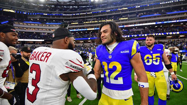 Jan 4, 2026; Inglewood, California, USA;  Los Angeles Rams wide receiver Puka Nacua (12) with Arizona Cardinals safety Budda Baker (3) on the field following a game at SoFi Stadium. Mandatory Credit: Gary A. Vasquez-Imagn Images