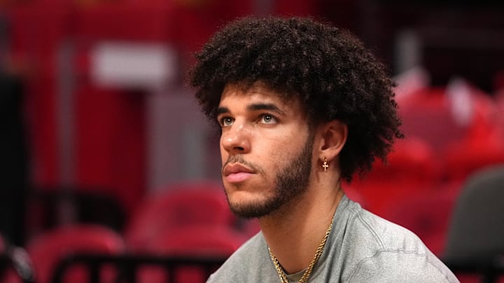 Dec 11, 2021; Miami, Florida, USA; Chicago Bulls guard Lonzo Ball sits court-side prior to the game against the Miami Heat at FTX Arena. Mandatory Credit: Jasen Vinlove-Imagn Images