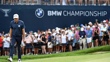 Keegan Bradley lines up a putt on the 18th hole during the final round of the BMW Championship at Castle Pines Golf Club. 