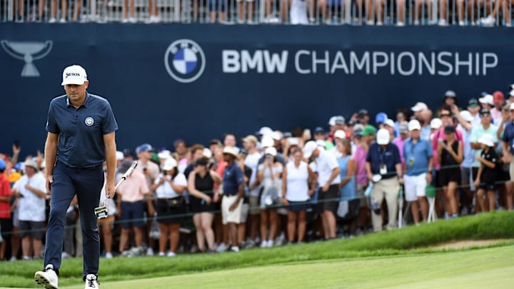 Keegan Bradley lines up a putt on the 18th hole during the final round of the BMW Championship at Castle Pines Golf Club. 
