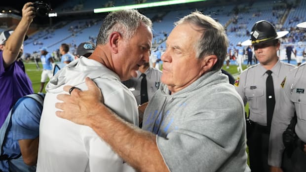Sep 1, 2025; Chapel Hill, North Carolina, USA; North Carolina Tar Heels head coach Bill Belichick with TCU Horned Frogs head 