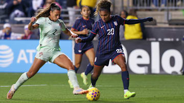 Catarina Macario battles Catarina Amado during the USWNT's 2-1 loss to Portugal.