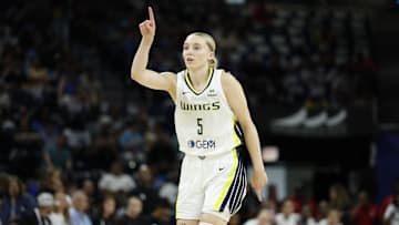 Jul 9, 2025: Dallas Wings guard Paige Bueckers scores against the Chicago Sky at Wintrust Arena.