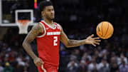 Mar 21, 2025; Cleveland, OH, USA; New Mexico Lobos guard Donovan Dent (2) plays the ball in the second half against the Marquette Golden Eagles during the NCAA Tournament First Round at Rocket Arena. Mandatory Credit: Rick Osentoski-Imagn Images
