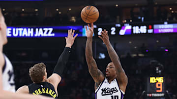 Oct 29, 2024; Salt Lake City, Utah, USA; Sacramento Kings forward DeMar DeRozan (10) shoots over Utah Jazz forward Lauri Markkanen (23) during the first quarter at Delta Center. Mandatory Credit: Rob Gray-Imagn Images