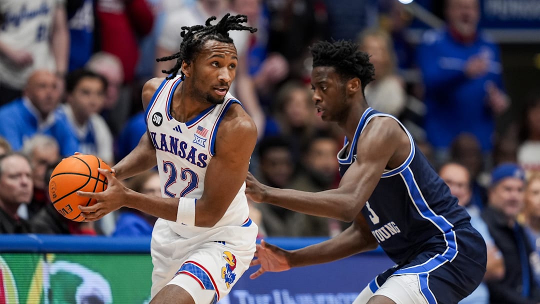 Jan 24, 2026; Columbia, Missouri, USA; Kansas Jayhawks guard Darryn Peterson (22) looks to pass against BYU Cougars forward AJ Dybantsa (3) during the first half at Mizzou Arena. Mandatory Credit: Jay Biggerstaff-Imagn Images Jan 24, 2026; Columbia, Missouri, USA; Kansas Jayhawks guard Darryn Peterson (22) looks to pass against BYU Cougars forward AJ Dybantsa (3) during the first half at Mizzou Arena. Mandatory Credit: Jay Biggerstaff-Imagn Images