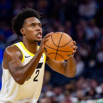 Apr 7, 2024; San Francisco, California, USA;  Utah Jazz guard Collin Sexton (2) shoots a technical free throw during the third quarter against the Golden State Warriors at Chase Center. Mandatory Credit: Bob Kupbens-USA TODAY Sports