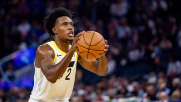 Apr 7, 2024; San Francisco, California, USA;  Utah Jazz guard Collin Sexton (2) shoots a technical free throw during the third quarter against the Golden State Warriors at Chase Center. Mandatory Credit: Bob Kupbens-USA TODAY Sports