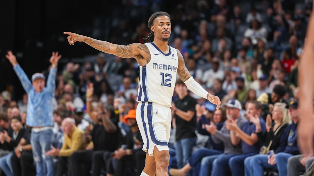 Memphis Grizzlies guard Ja Morant (12) reacts after a made basket against the Indiana Pacers during the first half at FedExForum. Memphis Grizzlies guard Ja Morant (12) reacts after a made basket against the Indiana Pacers during the first half at FedExForum.