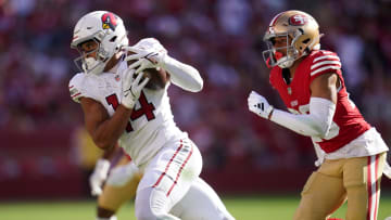 Oct 1, 2023; Santa Clara, California, USA; Arizona Cardinals wide receiver Michael Wilson (14) catches a pass in front of San Francisco 49ers cornerback Isaiah Oliver (26) in the fourth quarter at Levi's Stadium. Mandatory Credit: Cary Edmondson-USA TODAY Sports