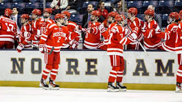 Boston University players celebrate goal during the Boston University-Notre Dame NCAA hockey game on Saturday, October 21, 2023, at Compton Family Ice Arena in South Bend, Indiana.