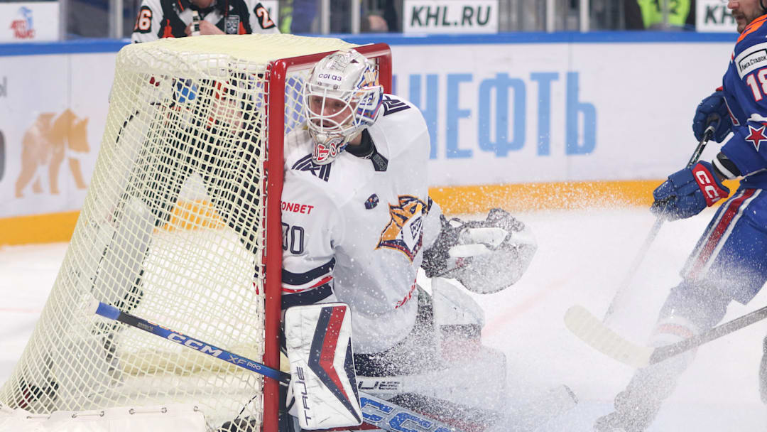 Ilya Nabokov (30) of Metallurg Hockey Club seen in action...