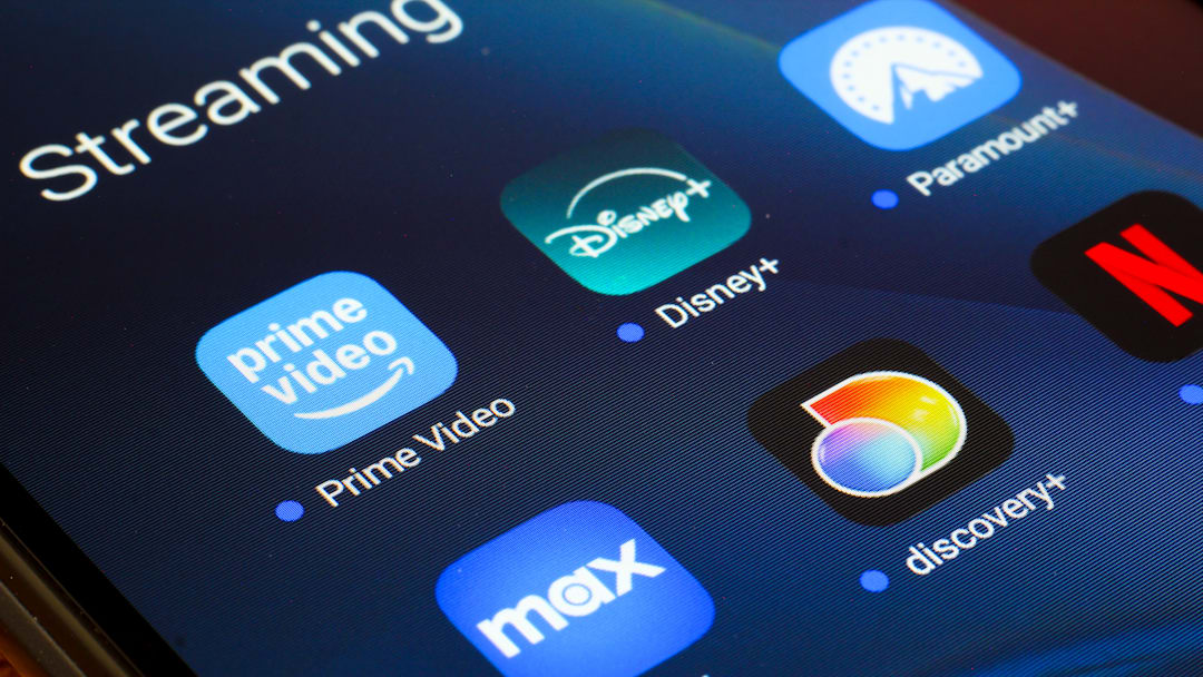 In this photo illustration, the video streaming apps Netflix... In this photo illustration, the video streaming apps Netflix...