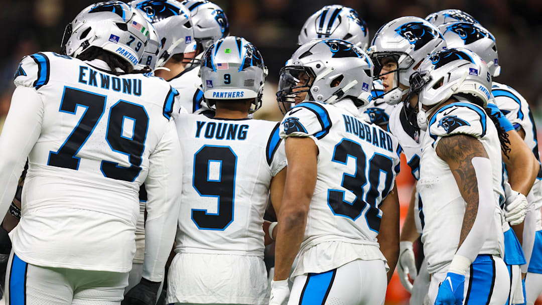 Dec 14, 2025; New Orleans, Louisiana, USA; Carolina Panthers quarterback Bryce Young (9) huddles with teammates during the first quarter against the New Orleans Saints at Caesars Superdome. Mandatory Credit: Stephen Lew-Imagn Images