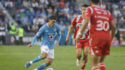 Erik Lira #6 of  Cruz Azul drives the ball forward during...